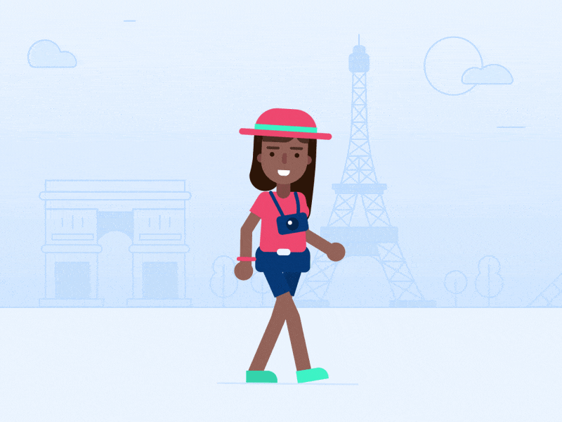 woman walking with international icons in background
