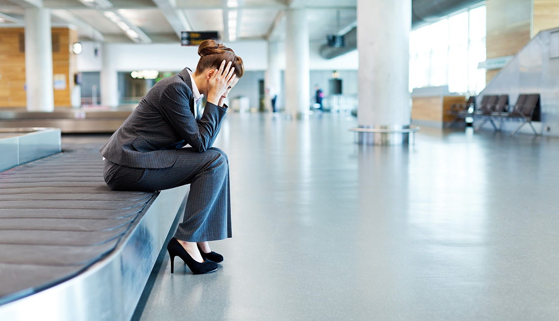 stressed woman with lost luggage